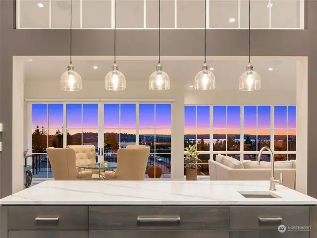 Invite guests to the open living and dining areas, which serve as a window onto the lake and cityscape.
