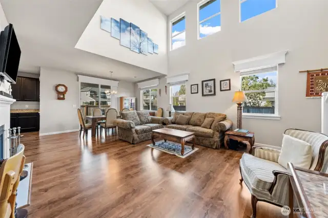 Elegant Touches Throughout – Engineered hardwood flooring, wood-wrapped windows, and custom wood valances.