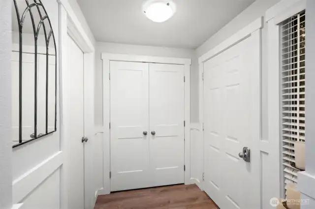 Enter from the garage or front porch with large coat closet