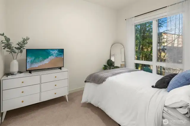 Primary Bedroom With Large Window