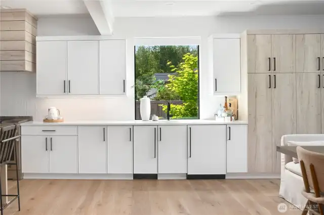 Separate area for adult beverages, and has separate wine/beverage refrigerator & a ton more windows