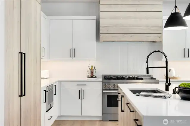 Main kitchen area with oversized cutom refrigerator
