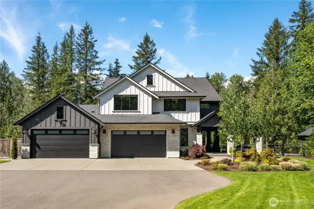Big, wide, sweeping driveway, generous for parking & accessing the 4 car garage