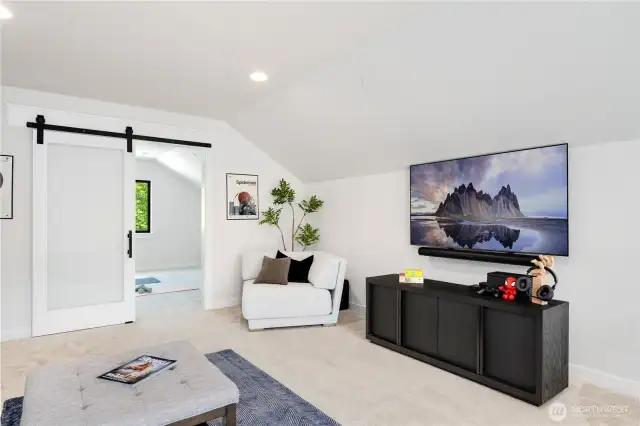 Barn door cleverly separates 3rd floor big room from exercise/den/bdrm area...you decide