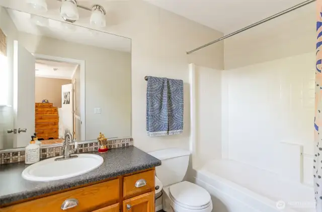 Bathroom in primary suite 2 on upper level.