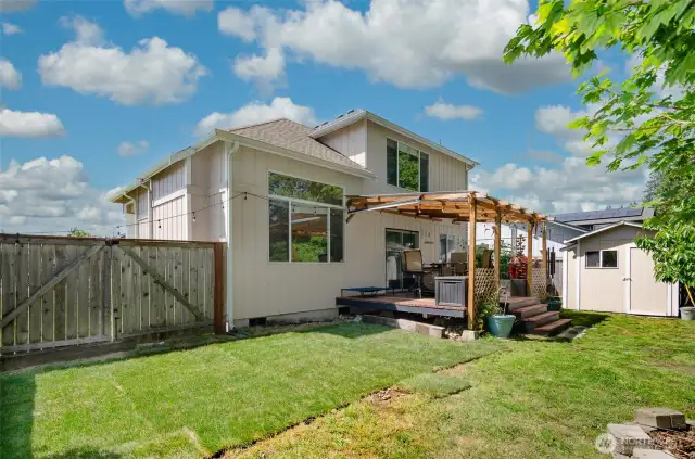 Fully fenced back yard. Storage shed