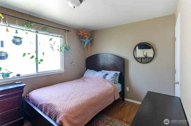 Main floor bedroom has two closets and a 3/4 bath right outside the door.