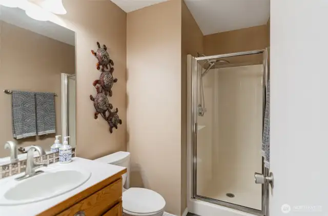 Main floor bath has a walk-in shower.