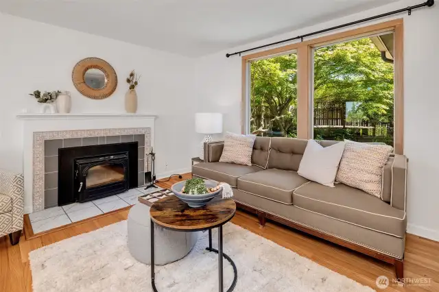 Bright windows let in natural light while the fence keeps inside private
