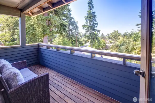 Enjoy coffee or a late night glass of wine from your primary suite's deck with Sound and Olympic views