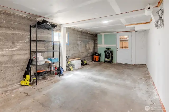 Garage was previously converted to a unfinished hobby area
