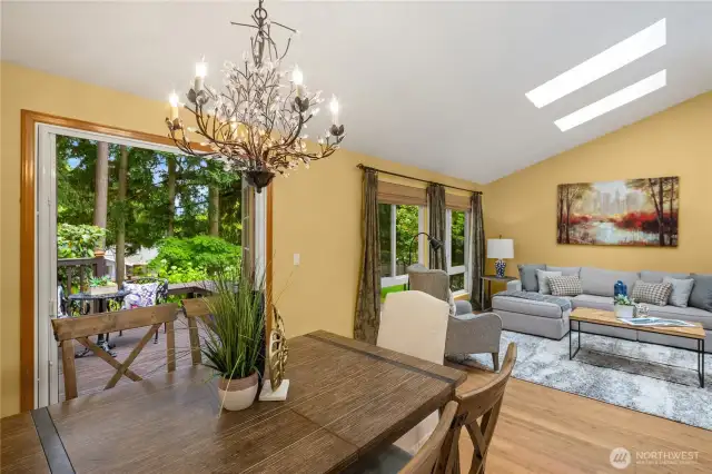 Dining room opens to both living room and a door to the kitchen.
