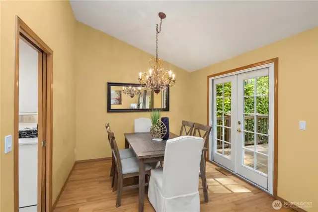 French Doors lead to the back deck, creating a lovely flow for summer BBQs and entertaining.
