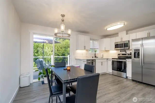 All new lighting, brand new cabinets, quartz countertops and stainless steel appliances