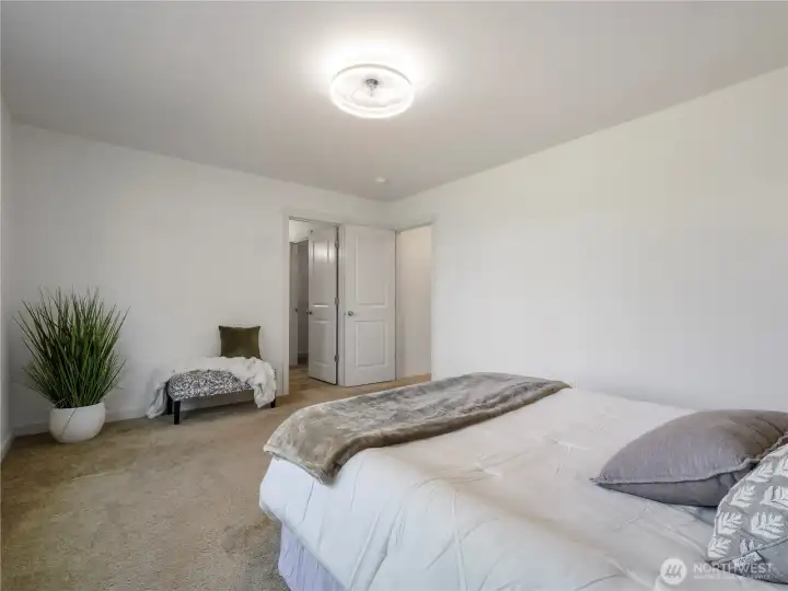 Another view of the primary bedroom.