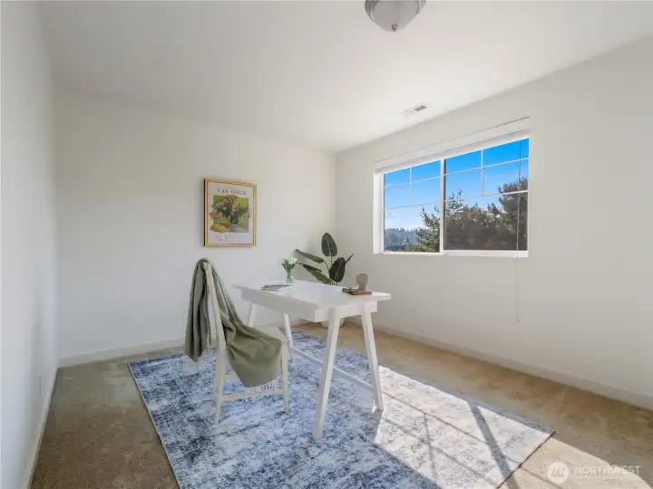 The upper level bonus room is the perfect space for an office, playroom, craft room, or possible 4th bedroom.