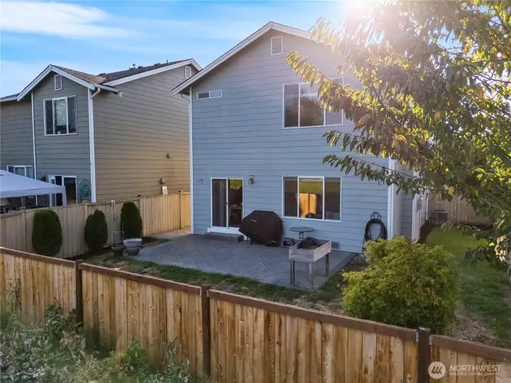 The backyard is fully fenced, with gardening spaces and room to create your own private oasis!