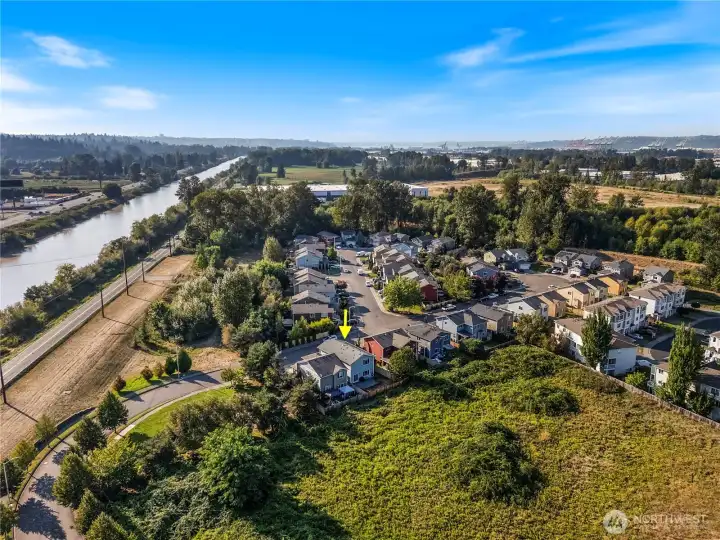Kelsey Lane is a small community of 49 homes nestled among mature trees and open spaces, with sidewalks, streetlights, a small park with playground and bordered by the Puyallup River to the south.