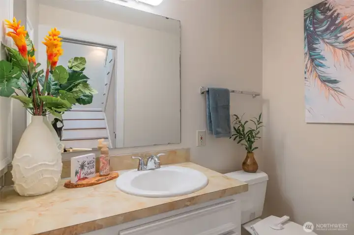Powder room for guest & convenience.
