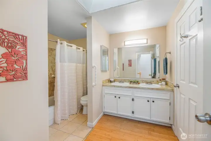 Large bathroom with great storage.