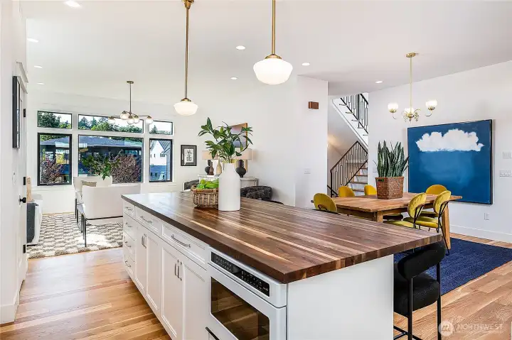 This is a WOW kitchen with large walnut-counter island.