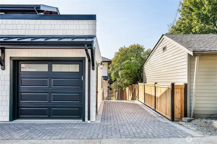 1 is in the detached garage and the other is this parking pad.