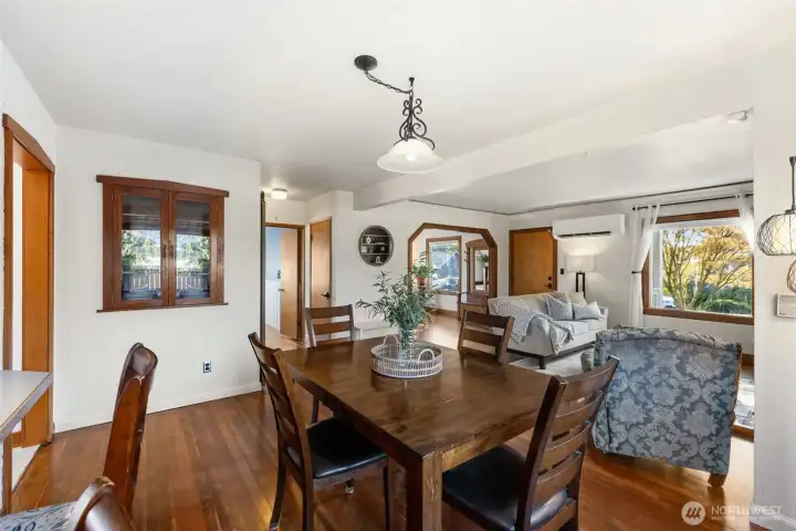 “Central to the home, this formal dining room offers an open, friendly layout—perfect for gatherings.”