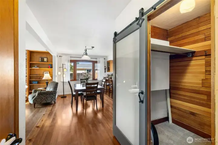 “Handy closet or pantry with a charming barn door—stylish and functional.”