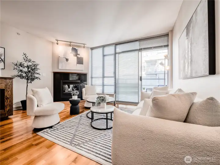 Gather around the elegant gas fireplace in this spacious, inviting living room perfect for entertaining