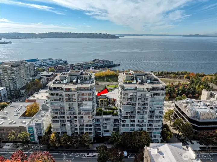 Elegant two towers overlooking Elliott Bay, sophisticated design, timeless views.