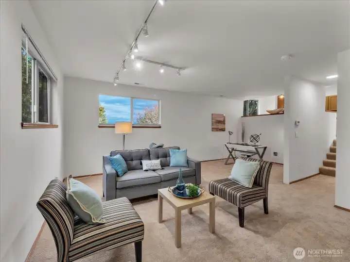 Large 2nd living area with new carpet.