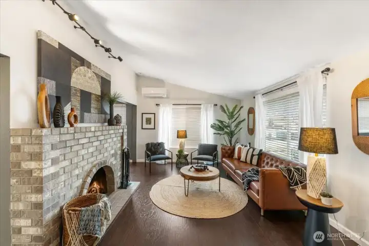 A light filled home featuring large windows that create an open, airy atmosphere.