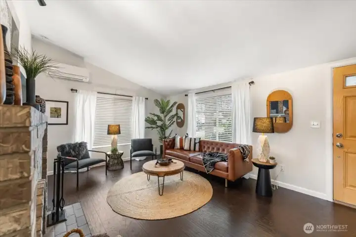 The generously sized living room provides an inviting space for gatherings and everyday living.