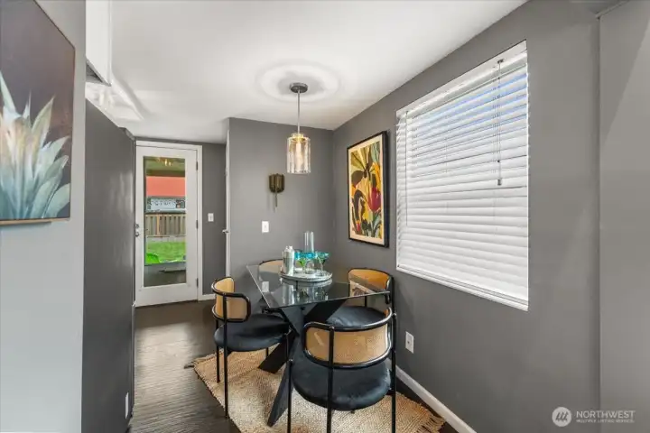 A charming, dedicated dining nook just off the kitchen, perfect for casual meals and morning coffee.