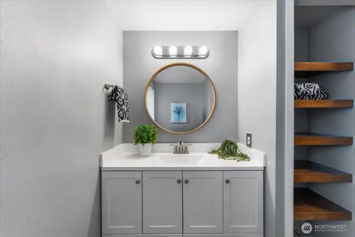 Designer paint color compliments this bathroom.