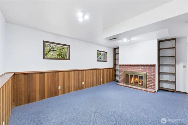 The fireplace downstairs is wood burning.