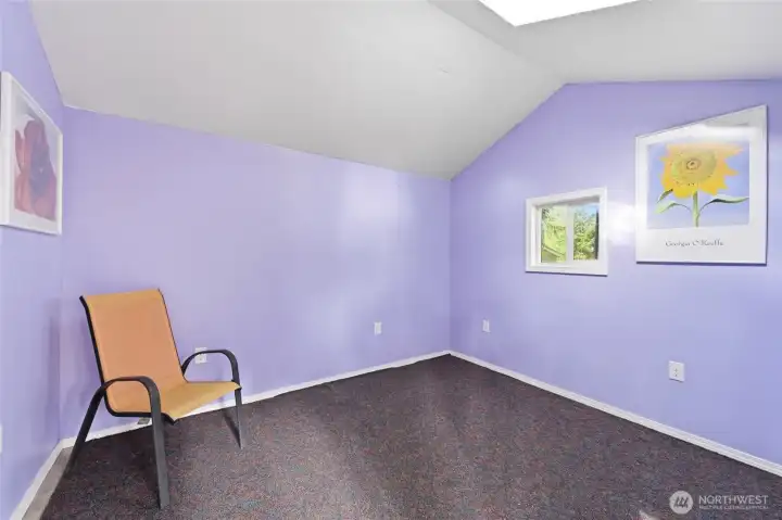 The studio is insulated and has electricity. The skylight allows natural light of fill the space.