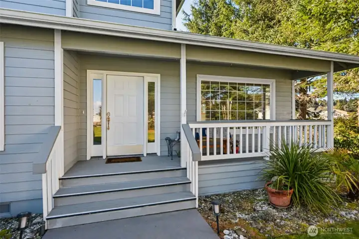Inviting front entrance with covered porch