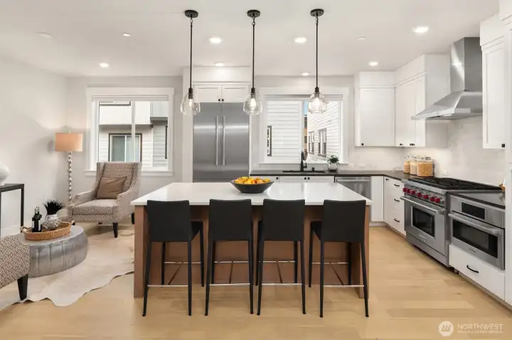 Entertainer’s kitchen layout with generous prep space, premium Bosch appliances, and modern farmhouse finishes.