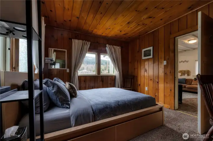 Bdrm#1 ~ Guest ready Queen bed with smart storage drawers, shelving, lighting, charging outlet and comfort controls.