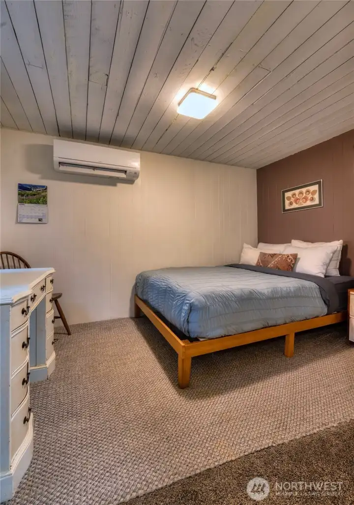 Bdrm #2 ~ Queen bed, writing desk, monitor, charging station and hidden storage containers.