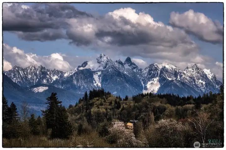 Panoramic views of the mighty Cascades ~ offering year round beauty and a true sense of NW Living!