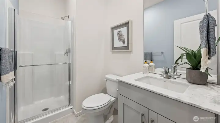 Main floor bathroom with easy access shower. Picture for representational purposes only, colors and features may vary. Main floor bathroom with easy access shower. Picture for representational purposes only, colors and features may vary.