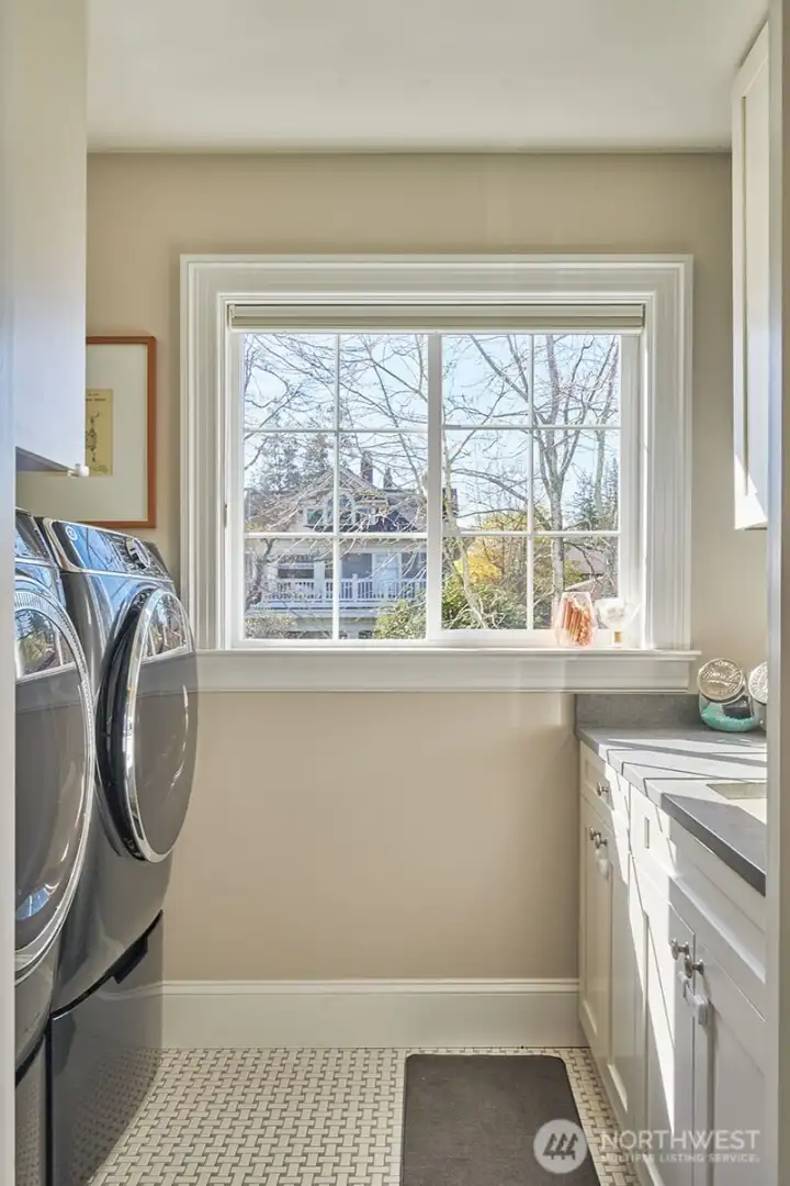 Laundry is conveniently located on the 2nd level and another on the lower level!