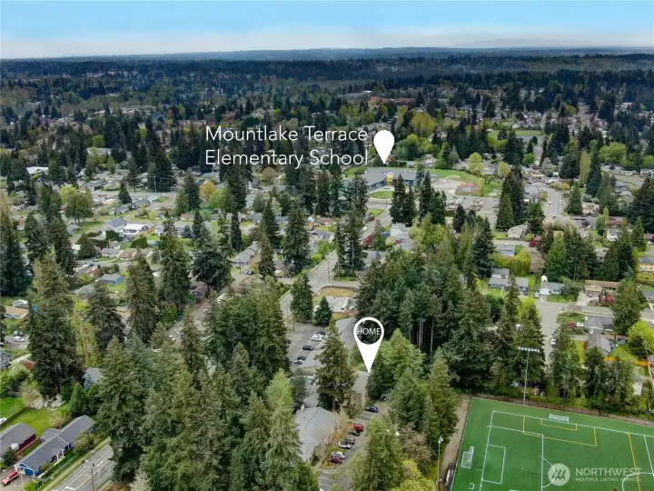 Aerial view showing proximity to MLT Elementary, just a couple blocks away! Aerial view showing proximity to MLT Elementary, just a couple blocks away!