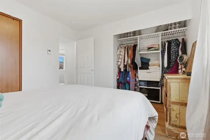 Primary Bedroom that has a door to connect to the bathroom.