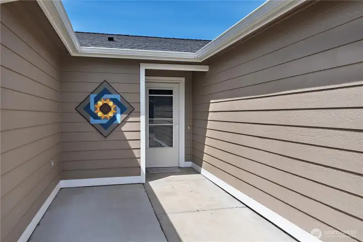 Such a great entry area ~ enjoy sitting on the front patio protected from the weather.