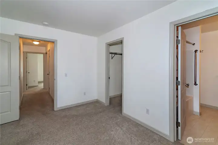 Primary bedroom with walk in closet and spacious ensuite bath.
