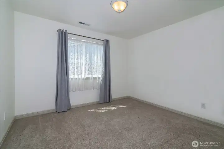 Light filled 2nd bedroom does not disappoint.