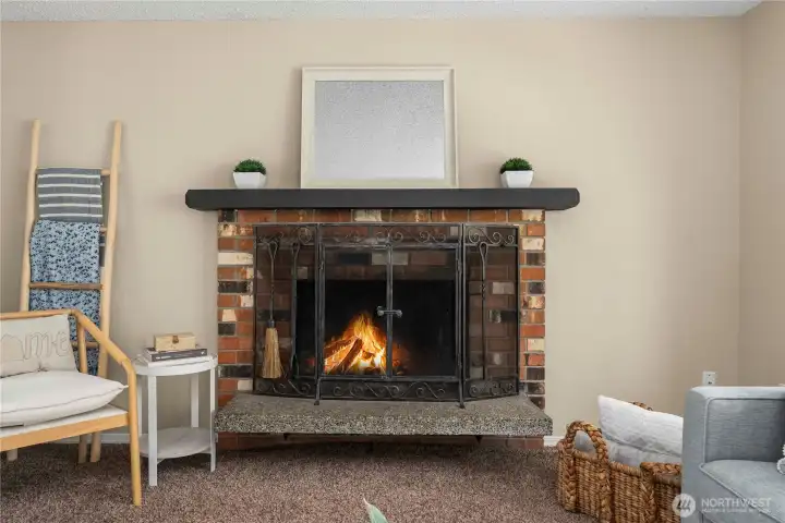 Wood burning fireplace with warm brick accents
